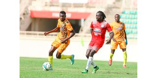 Victor Omune (left) of AFC Leopards vies with Michael Apudo of Posta Rangers