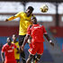 Tusker's Daniel Sakari (left) vies for an aerial ball with Lumumba Issa of Ulinzi Stars