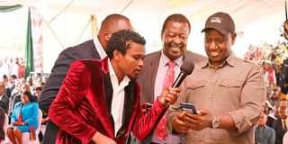 President William Ruto (right) and Prime Cabinet Secretary Musalia Mudavadi (centre) during the launch of the Hustler Fund 