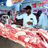 An attendant at Zad’s Butchery and Meat Suppliers stocks up fresh meat at Burma Market in Nairobi