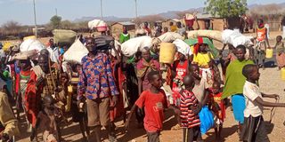 Residents of Lokwar and Kaputir villages in Turkana South Sub County fleeing towards Kalemngorok centre on March 25, 2023
