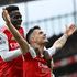 Arsenal midfielder Granit Xhaka (right) celebrates with team mate Bukayo Saka 