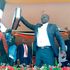 West Pokot Governor Simon Kachapin displays a flag and county seal at his swearing in ceremony on August 25, 2022.