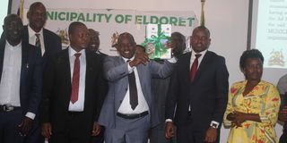 Governor Jonathan Bii receives a report on the proposed elevation of Eldoret town to city status on April 4, 2023
