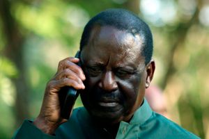 Azimio leader Raila Odinga in a phone call during Azimio Parliamentary Group Presser at Kalonzo Command Centre