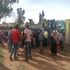 Members of the public at the scene where an angry mob lynched and burnt a suspected thug in Makutano town