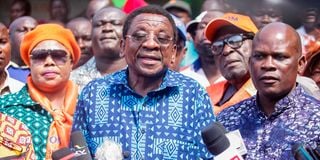 Siaya Governor James Orengo (left) and his deputy William Oduol (right) address journalists in Siaya town