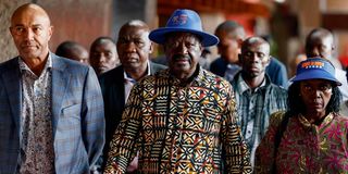 Azimio leader Raila Odinga (centre) and his running mate Martha Karua