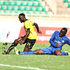 Tusker midfielder Shaphan Siwa (left) vies with Kenya Police defender Harun Shakava