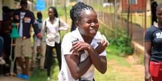 Overwhelmed relatives of accident victims outside the morgue at Migori Referral Hospital in Migori town