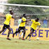 Tusker midfielder David Odoyo (centre) celebrates with teammates 