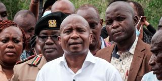 Interior Cabinet Secretary Kithure Kindiki (centre) speaks after visiting the mass-grave site in Shakahola