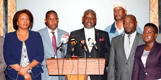 Rarieda MP Otiende Amollo (centre) and other members of the bipartisan committee address journalists