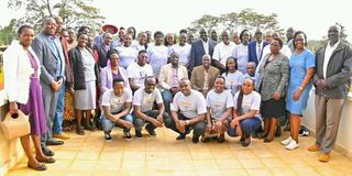 Governor Stephen Sang (seated at the centre in cream coat) with some of the25  students from Nandi who went to study in Finland