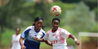 Lydia Waganda (left) of Gaspo Women vies for the ball with Ketsia Ikhungu of Ulinzi Starlets 