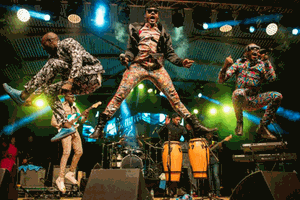 Members of Sauti Sol during a past live performance on stage.