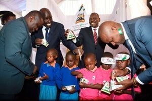 Basic Education PS Belio Kipsang and Uasin Gishu Governor Jonathan Bii and Cooperatives PS Patrick Kilemi 