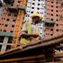 A worker at affordable housing units under construction at Pangani Redevelopment Site