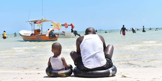 Local tourists enjoy the Sandy Beaches in Mombasa.