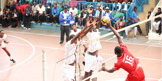 Kenya Prisons outside hitter Dennis Esokon goes for attack