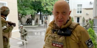 Yevgeny Prigozhin speaking inside the headquarters of the Russian southern military district in the city of Rostov-on-Don