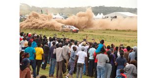 Fans parade to have a view of the WRC Safari Rally 