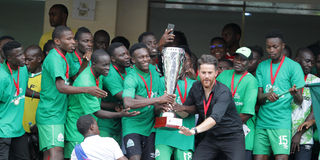 Gor Mahia coach Jonathan McKinstry (in black shirt) celebrates with his players