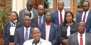 Governor Jonathan Bii accompanied by his deputy John Barorot second (left) and other Uasin Gishu county officials on July 11