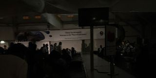Passengers at the Jomo Kenyatta International Airport stranded in darkness. 