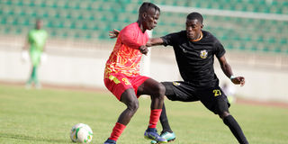 Khamis Atari (left) of Al Merriekh FC Juba