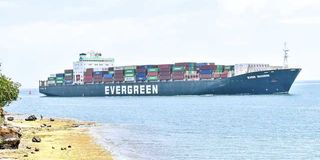 A container vessel passes through the Kilindini harbour at the Port of Mombasa. 