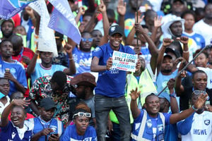 AFC Leopards fans cheer their team 