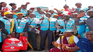 President William Ruto with some of the community health promoters