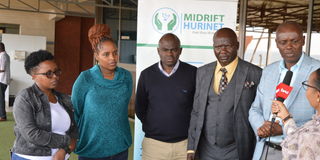 Mr Joseph Omondi (right) the executive director of Midrift Hurinet 