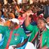 Teachers raise their hands at Kakamega Hill School 