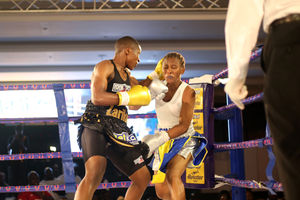 Kenya's Fatuma Zarika (left) fights against Tanzania's Fatuma Yazidu