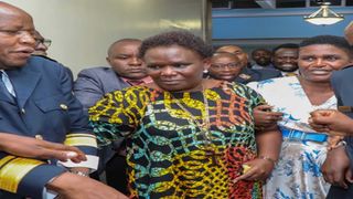 Meru Governor Kawira Mwangaza (centre) at Parliament Buildings 