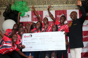 RentCo Africa Founder and Chief Executive Officer Robert Nyasimi hands over a Sh1 million cheque