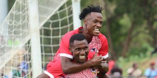 Shabana striker Vincent Nyabuto (front) celebrates his goal with teammate Brian Machira