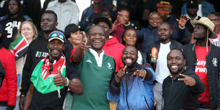 Rugby fans follow the action 