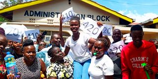 Golden Elite School Kisumu County celebrating their top candidate in the school, May Maggy Sunday