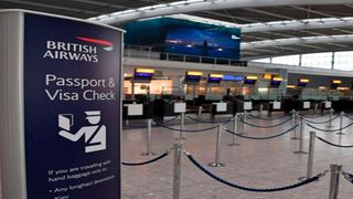 Unused check-in desks at Heathrow airport.