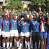 Nairobi Water players and officials celebrate with the trophy