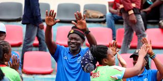 Nairobi Water coach Jack Ochieng congratulates his players