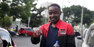 Joseph Methu flaunts the key to his brand new Nissan Note