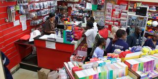 Parents purchase school items at Khimji Bookshop in Nyeri town