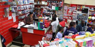 Parents purchase school items at Khimji Bookshop in Nyeri town