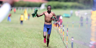 Daniel Simiu waves his wins jersey