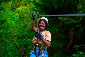 Joanna Neema zip lining at Kereita forest at one of Matembezi Travelers Club. 