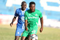 Gor Mahia forward Benson Omalla (right) controls the ball under pressure Nairobi City Stars defender Rowland Makati 